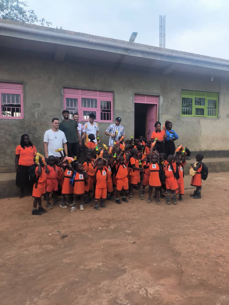 Volunteer engaging with children during activities at the orphanage